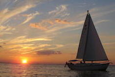 Sailboat at sunset in Chesapeake Bay